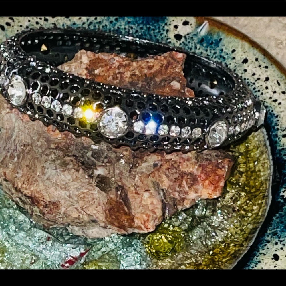 IMAN Global Chic Silver Crystal Bangle w/ IMAN storage bag. Approximately 8".